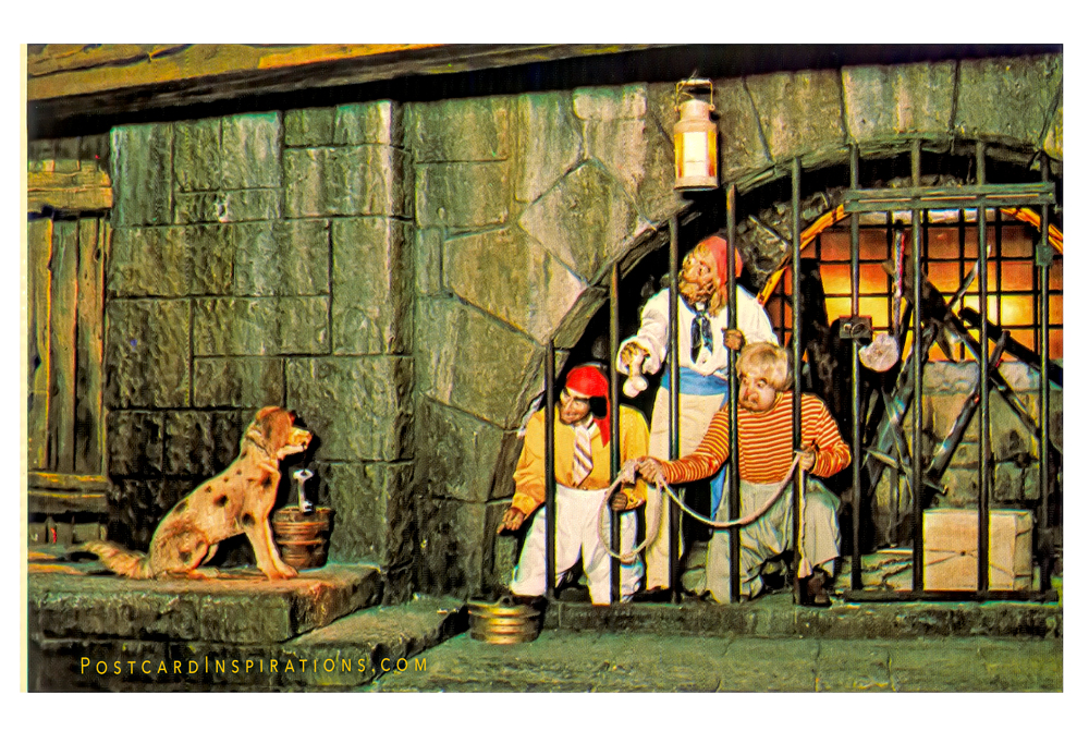 It's A Dogs Life! (Postcard) Pirate rogues, caught looting and burning, try to entice the dungeon master’s dog to bring them the key to their jail… All part of Adventureland’s swashbuckling Pirates of the Caribbean.